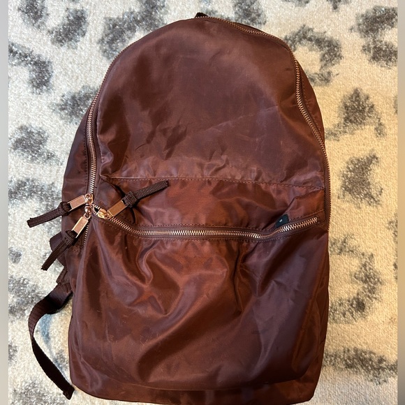 Urban Outfitters Handbags - Urban outfitters bronze/brown backpack